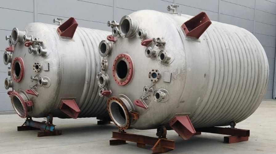 Two limpet coil reactors with multiple nozzles