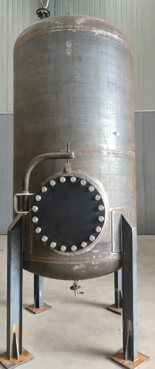 Carbon steel vessel with bolted manway on legs