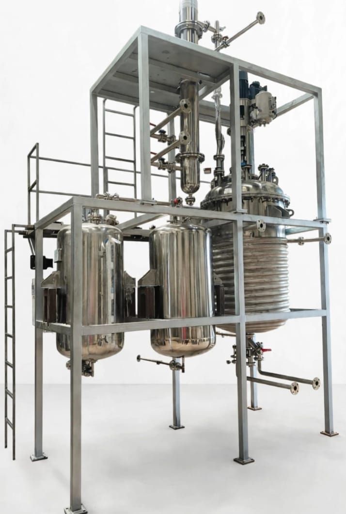 Skid-mounted reactor with overhead condenser and twin receivers